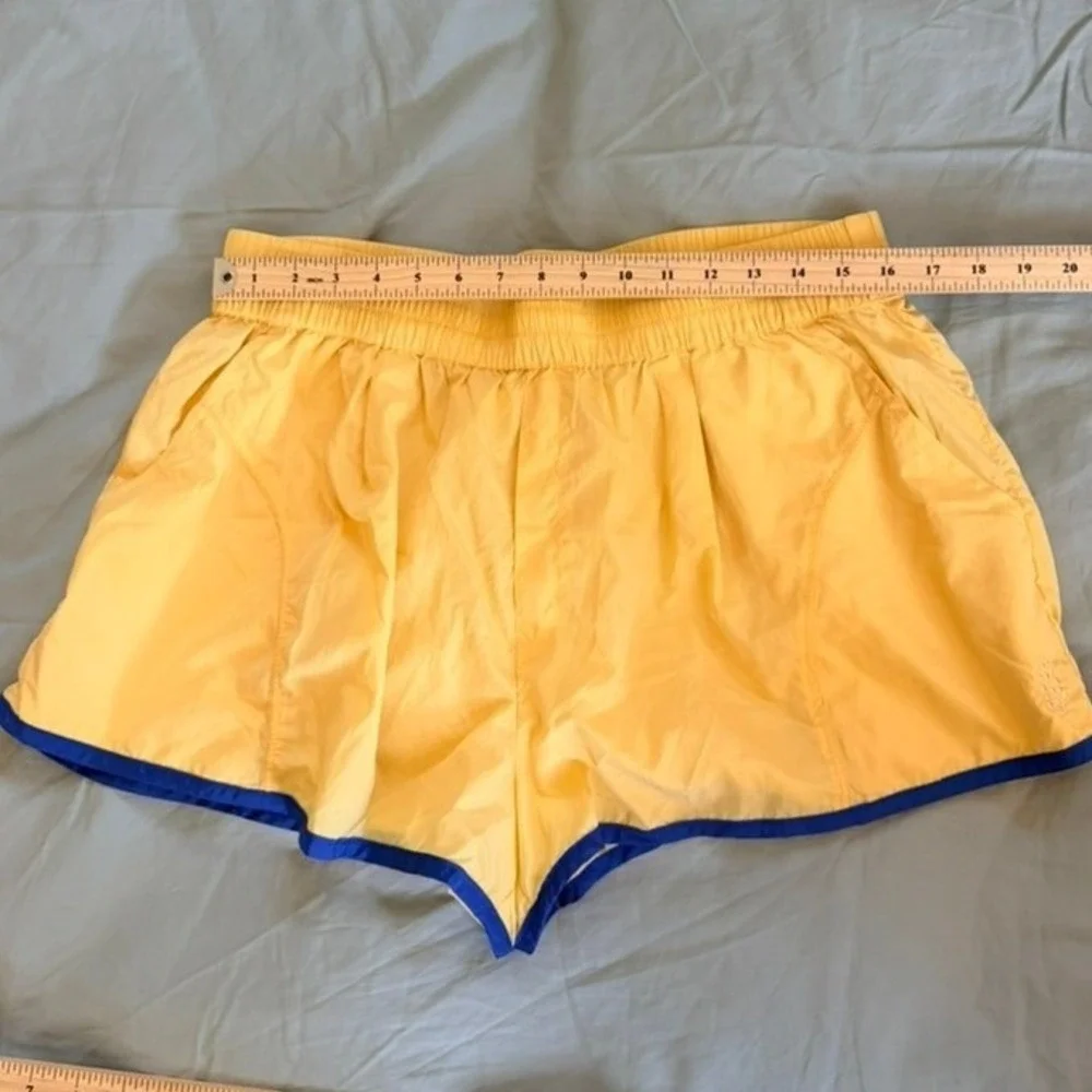 Free People FP Movement World Tour Pullover and Shorts Set Yellow Blue NWT